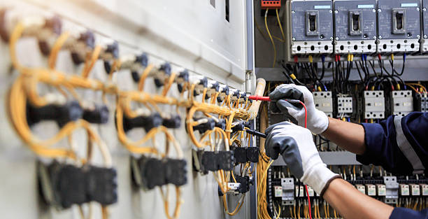 Professional Electrician technician working in Home, WA